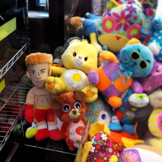 Not sure what Ivan Drago is doing in the Claw-Toy-Grabber machine.