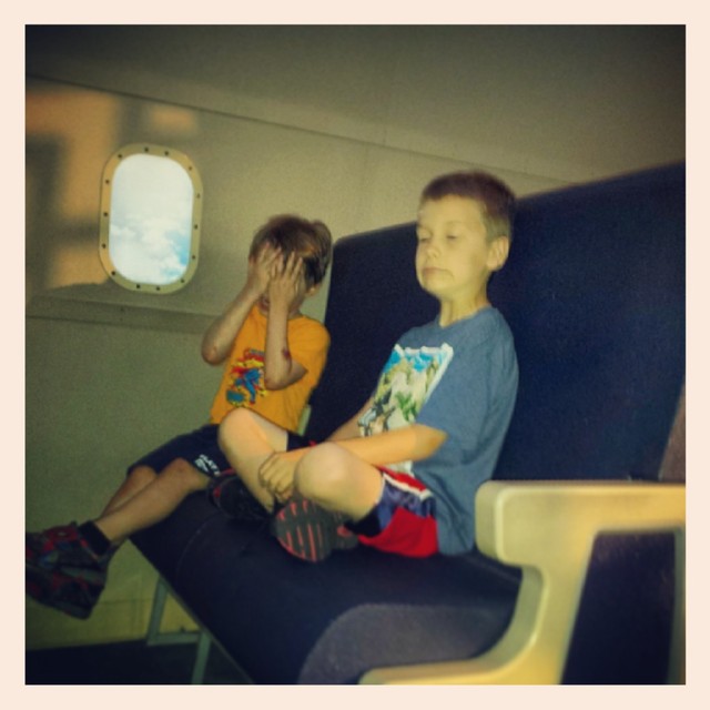 Max & Gabe enjoying their flight to China.