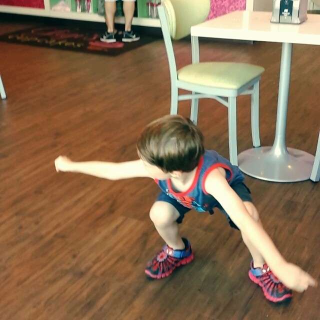 Max practices kung-fu at Gigi's Cupcakes