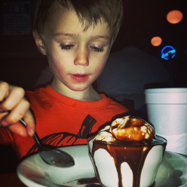 With Mom on her way to the Persian Gulf, Max digs in to a very not-nutritious dessert with his dad @ the Stacked Pickle...